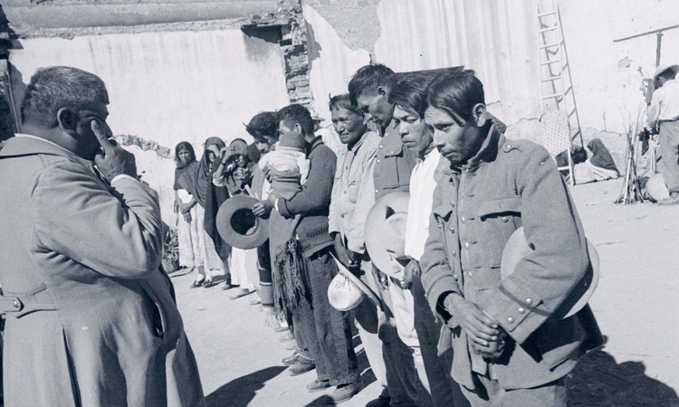 Men standing in a line. Photography